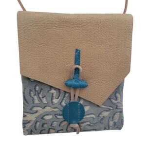 Artisan Handcrafted Leather and Fur Crossbody Bag with Blue Toggle Closure‎